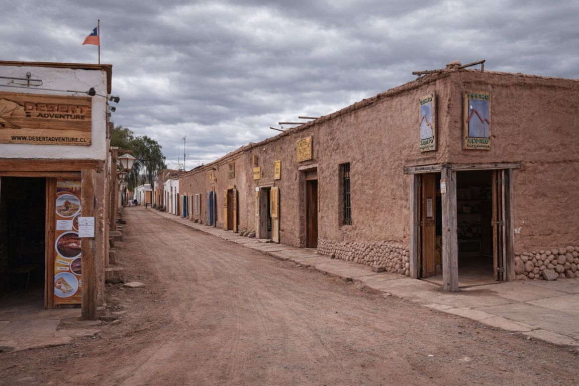 Caracoles Street in San Pedro de Atacama with traditional adobe buildings, photographed during a guided city walk with Atacama Chile Tours.